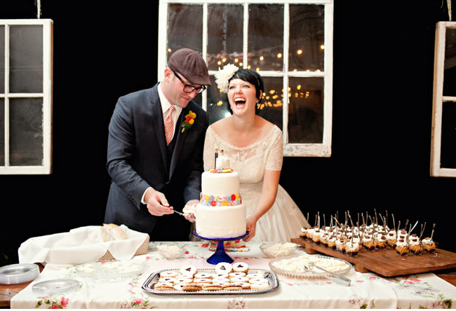 dessert bar, bride and groom cutting cake