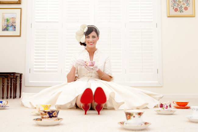 bride with red soled shoes