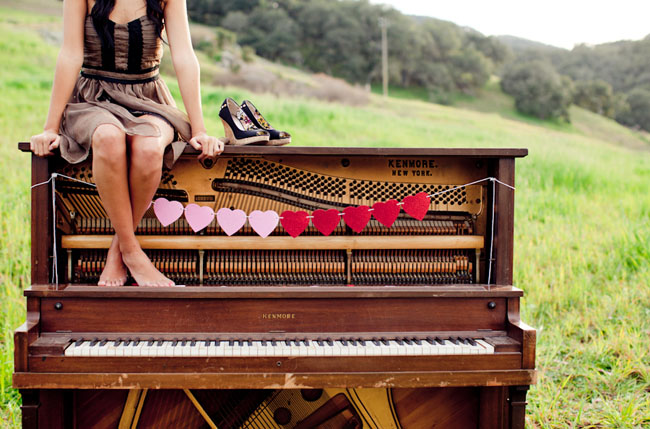string of hearts on piano