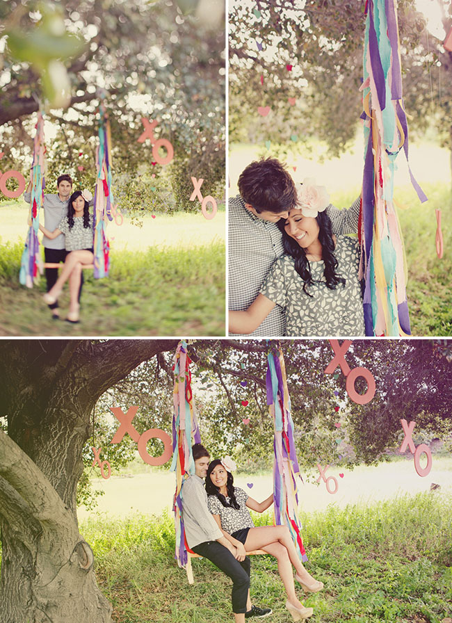 engagement photos on a swing with ribbons