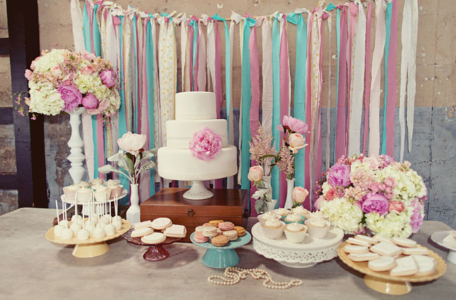 cake dessert display table ribbons hanging