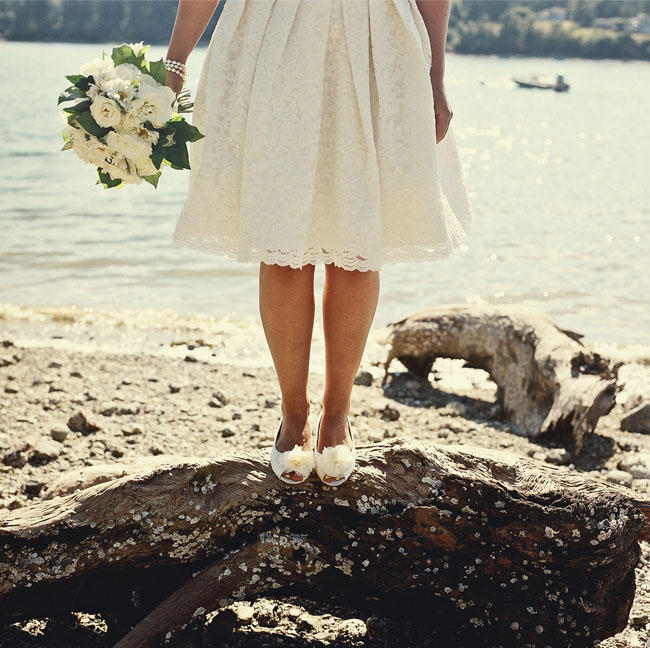 bride in knee length wedding dress