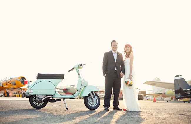 bride and groom on a scooter