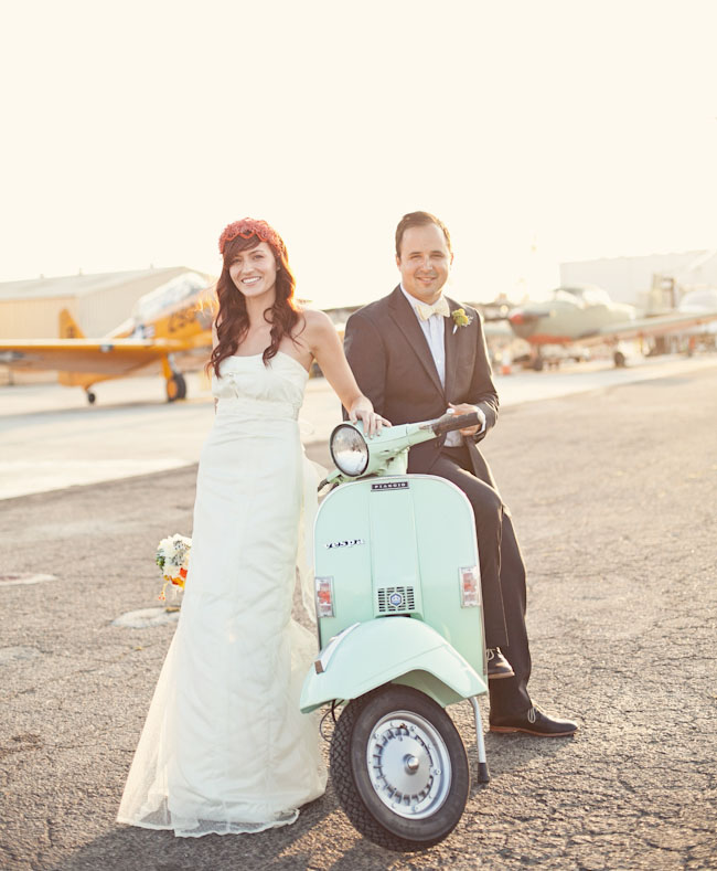 bride and groom on a scooter
