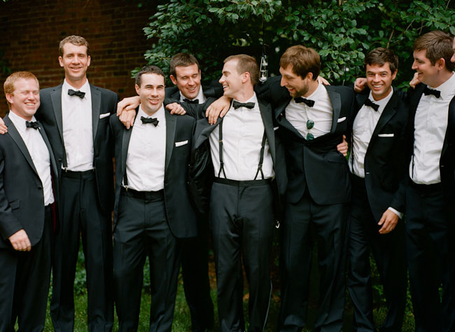 groomsmen in black tuxes