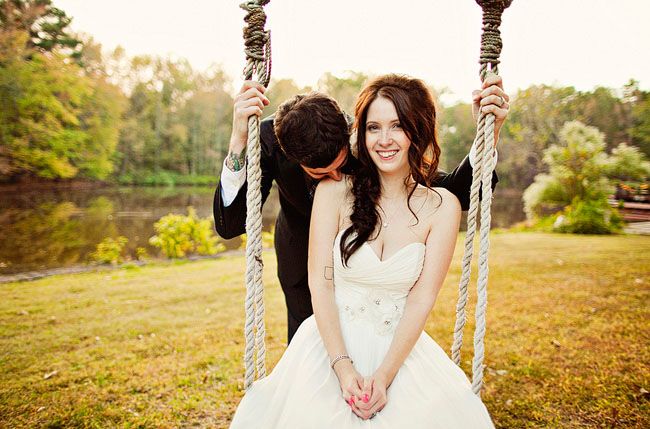 bride and groom on a swing