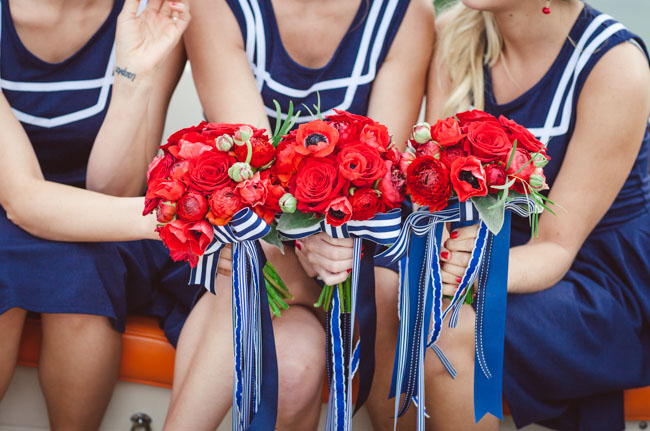 red bridesmaid bouquets