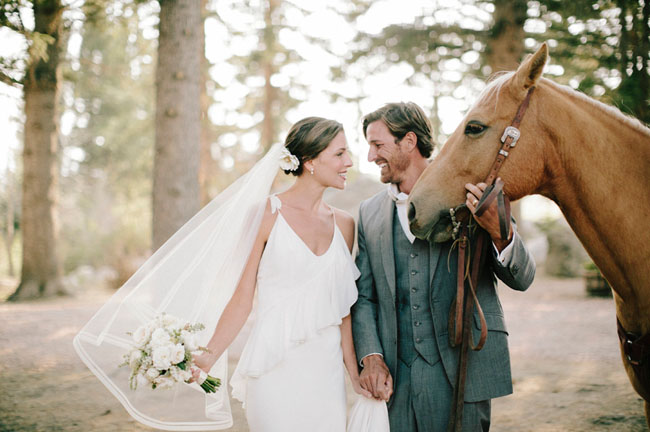 bride and groom with horse