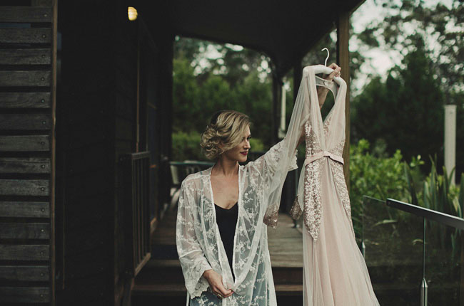 bride holding dress