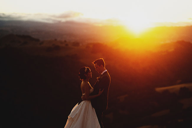 sunset bride and grooms