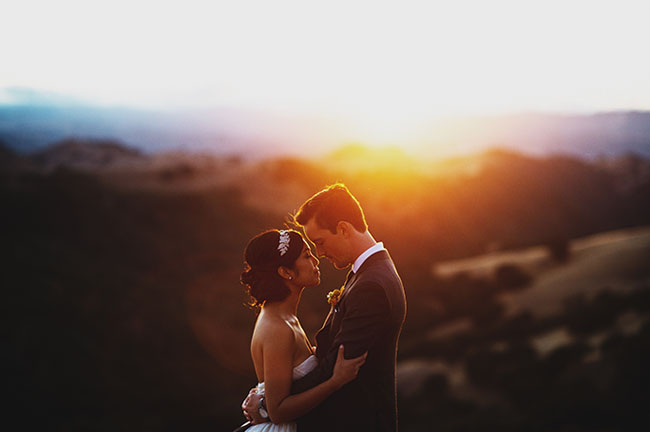 sunset bride and grooms
