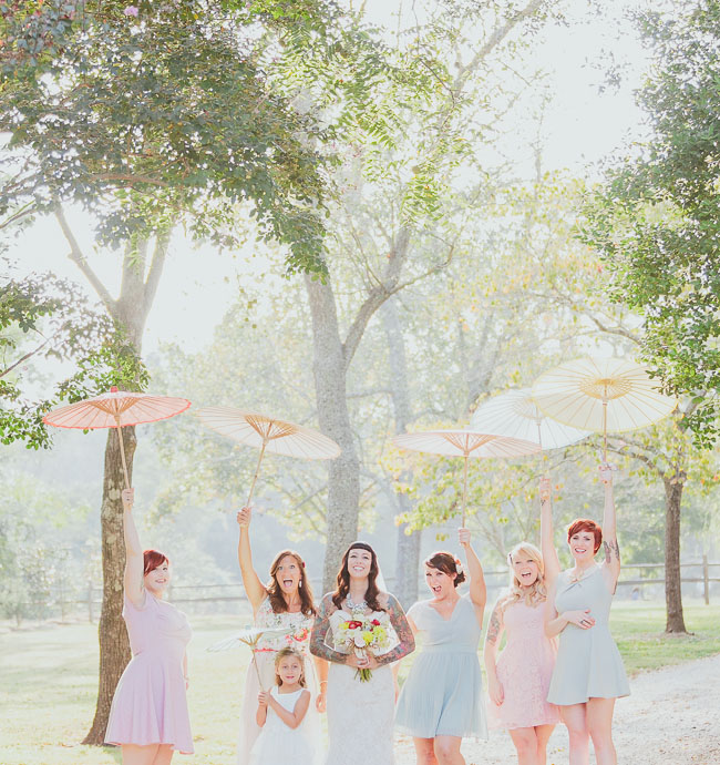 bridesmaids with umbrellas