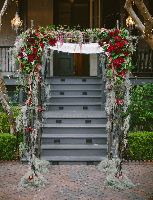 red rose and spanish moss arbor