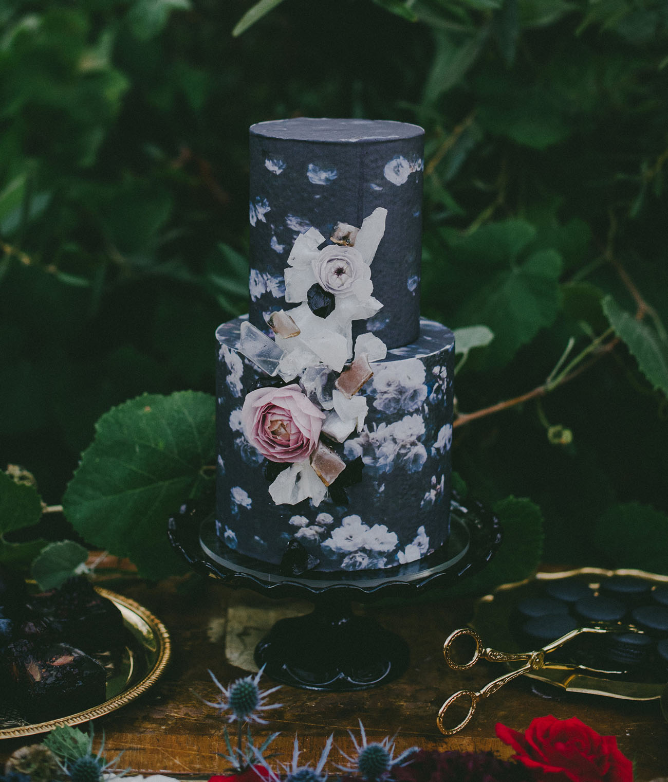 black wedding cake with flowers