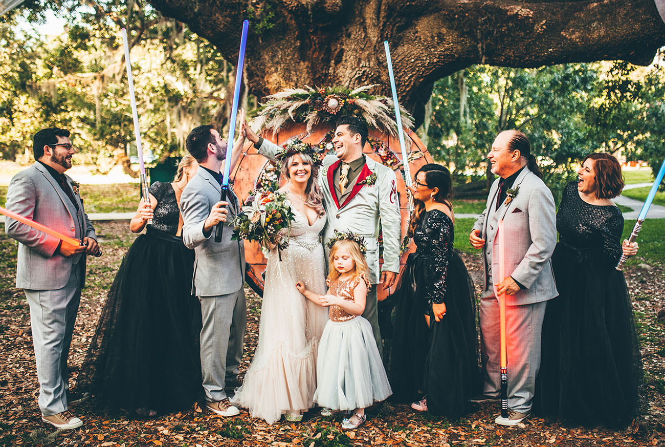 Star Wars wedding party with lightsabers