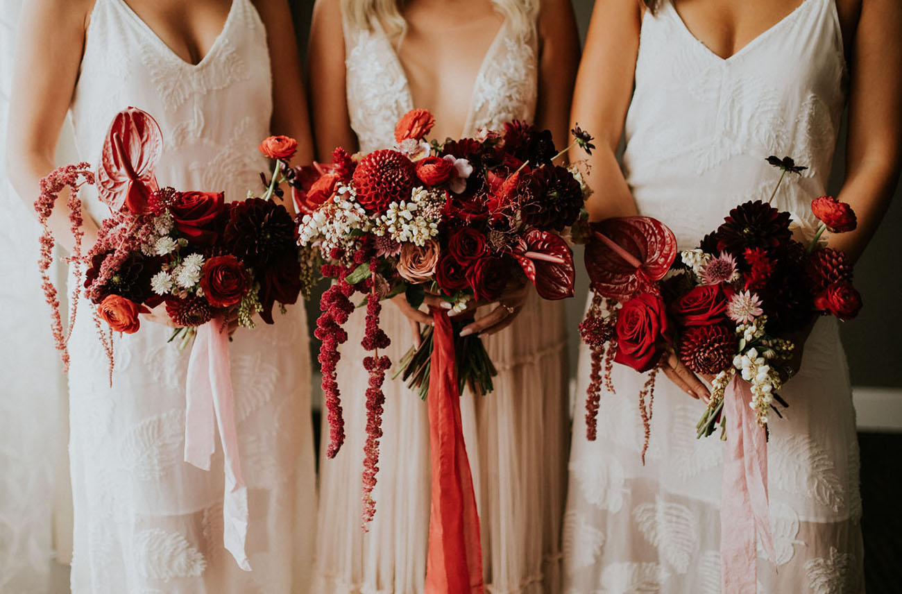 red bridesmaid bouquets
