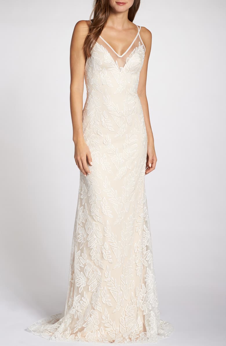 TADASHI SHOJI Lace Appliqué V-Neck Tulle Wedding Dress, Main, color, IVORY/ PETAL SIZE INFO True to size. DETAILS & CARE 60" length Hidden back-zip closure V-neck Sleeveless Column skirt with slight train Lined 60% polyester, 40% nylon Dry clean Imported Wedding Suite Item #5775445 Helpful info: The Best Dress for Your Body Type Free Shipping & Returns See more (2) Lace Appliqué V-Neck Tulle Wedding Dress