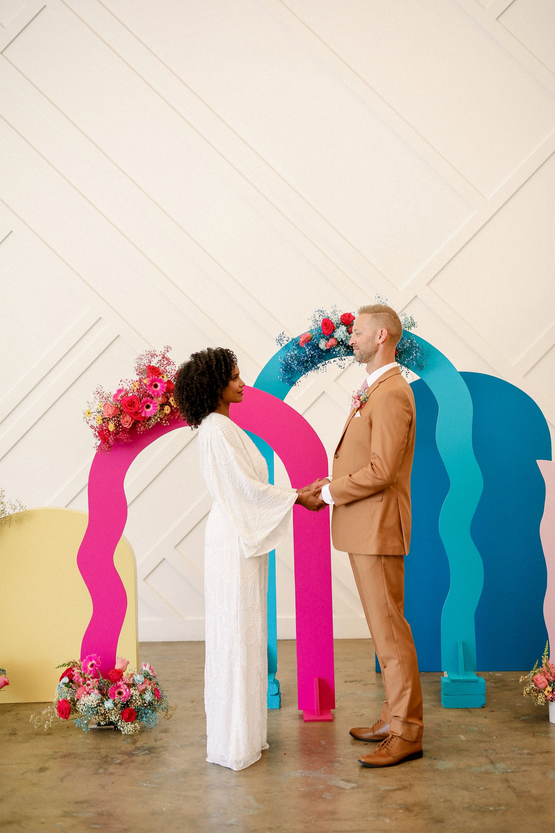 colorful cutout shapes DIY wedding backdrops
