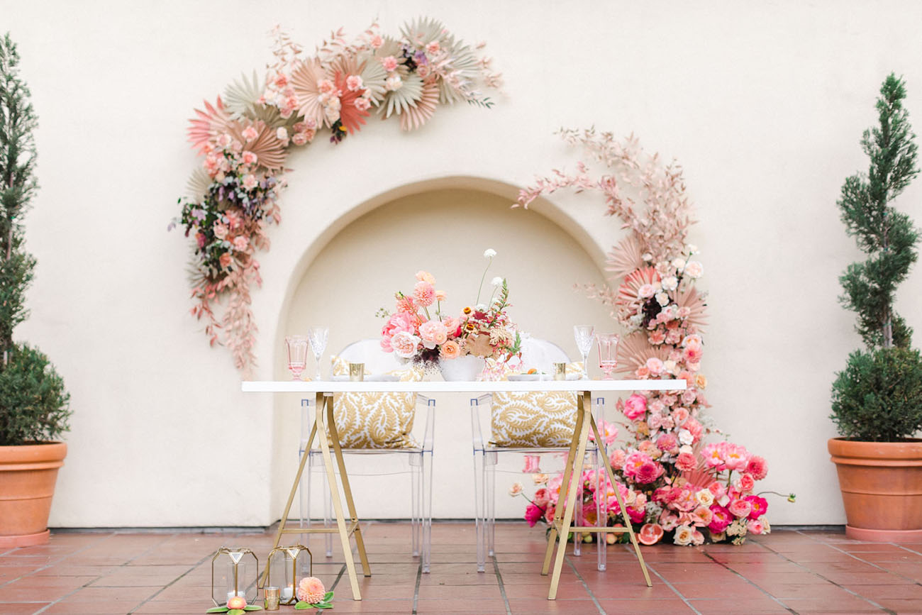 pink floral wall wedding reception