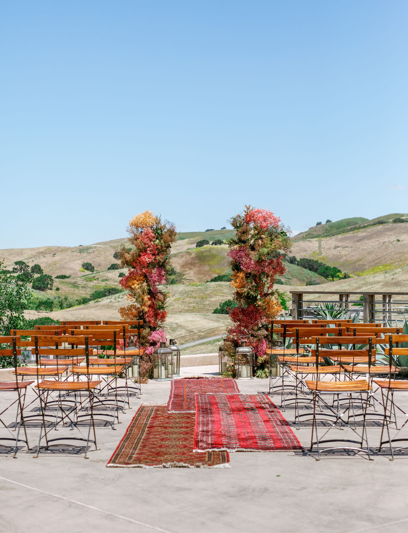 outdoor floral wedding backdrop installation