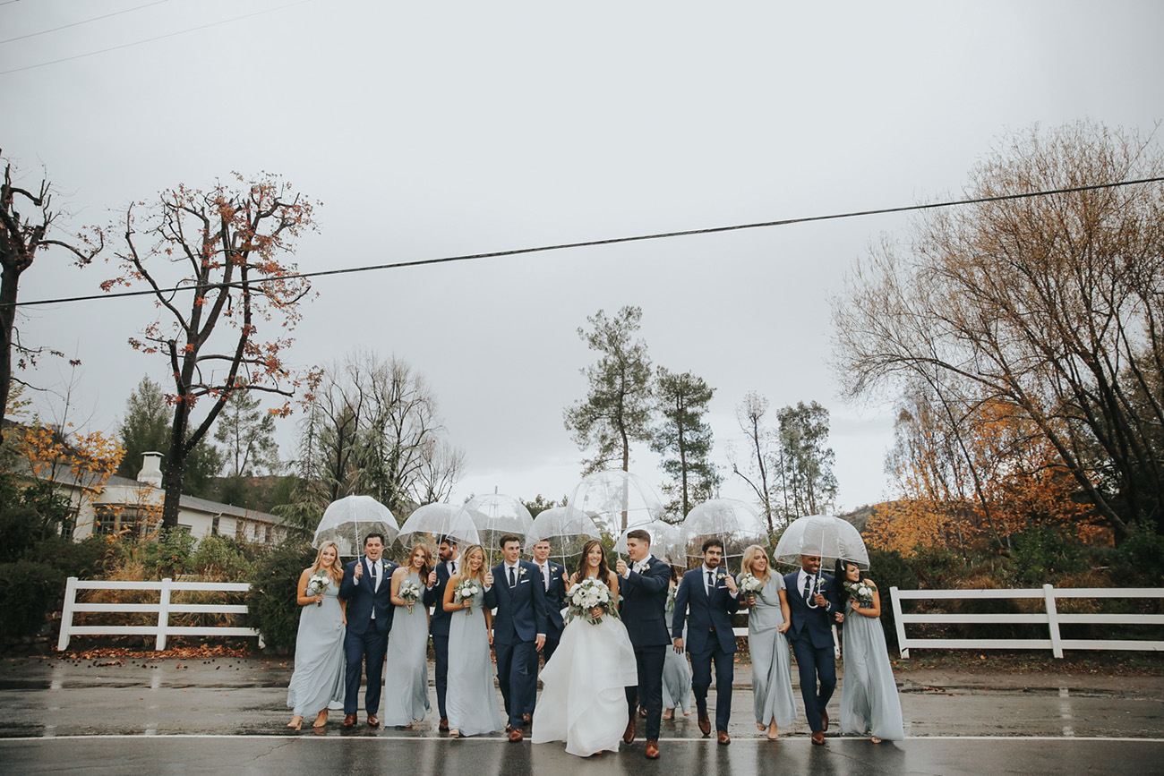 wedding party in the rain
