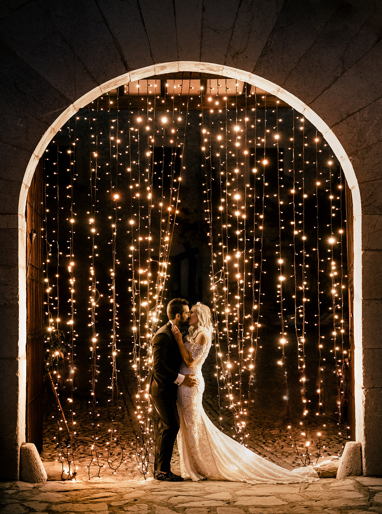 Carter Lace Wedding Dress by Lovers Society x Green Wedding Shoes Under a String of Lights