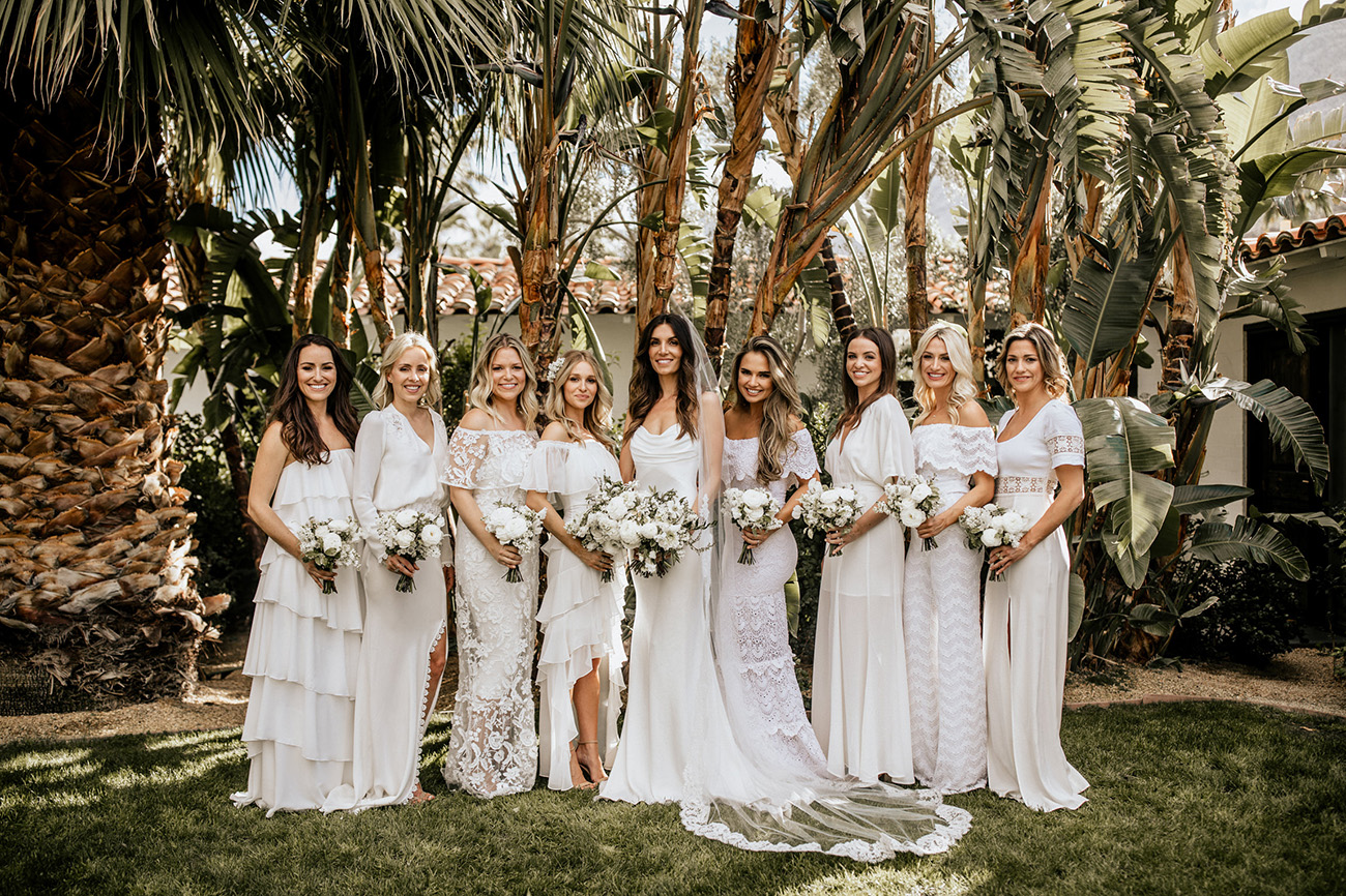 mismatched bridesmaids in white