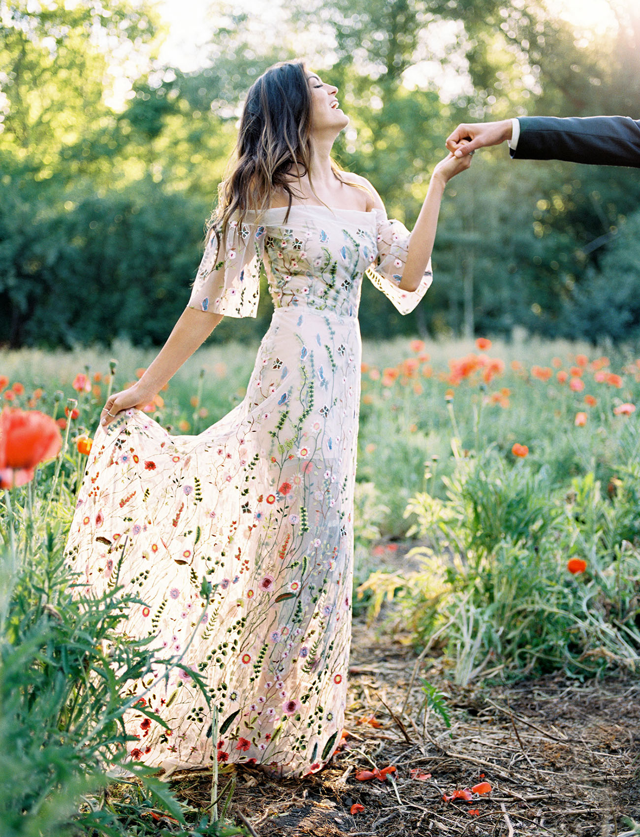 Embroidered wedding dress with wildflower pattern