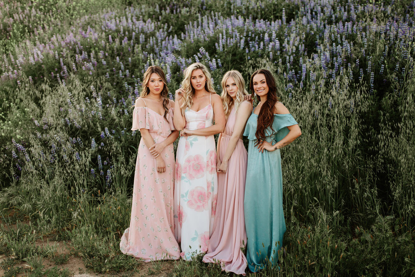 bridesmaids mixing prints for their dresses