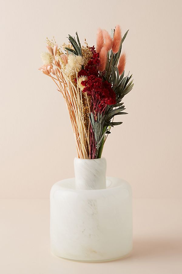 dried pink bouquet of flowers in white vase