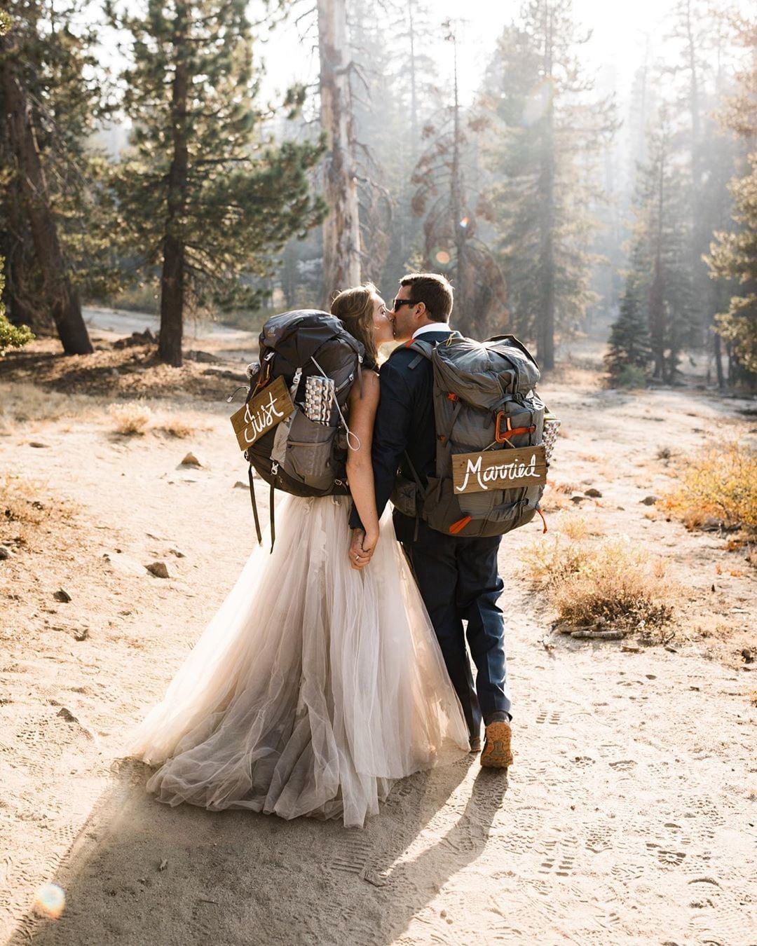 bride and groom backpackers