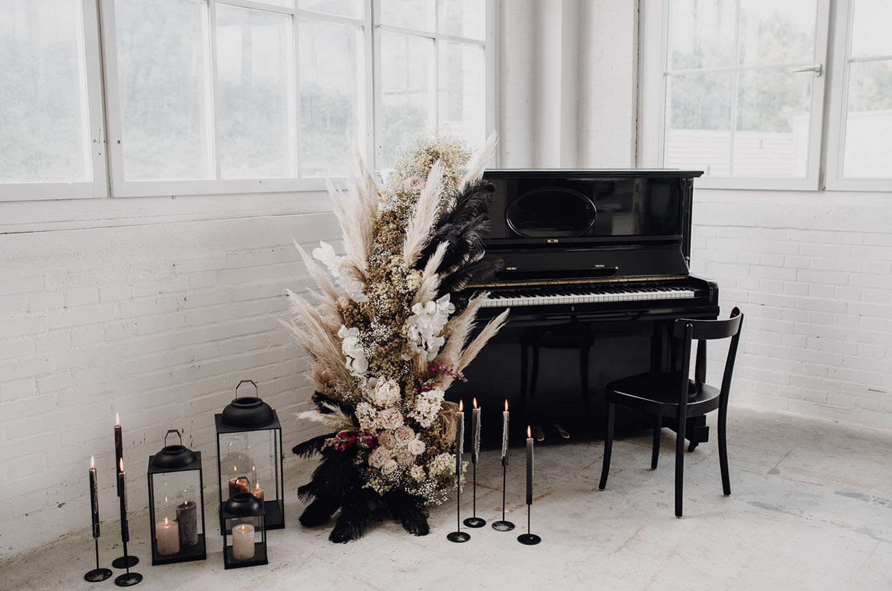 black piano wedding decor