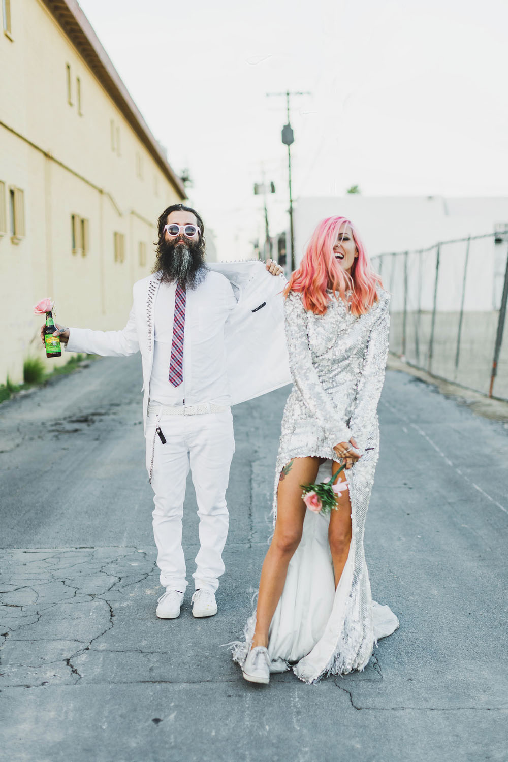 bride in sequin dress with white sneakers for wedding
