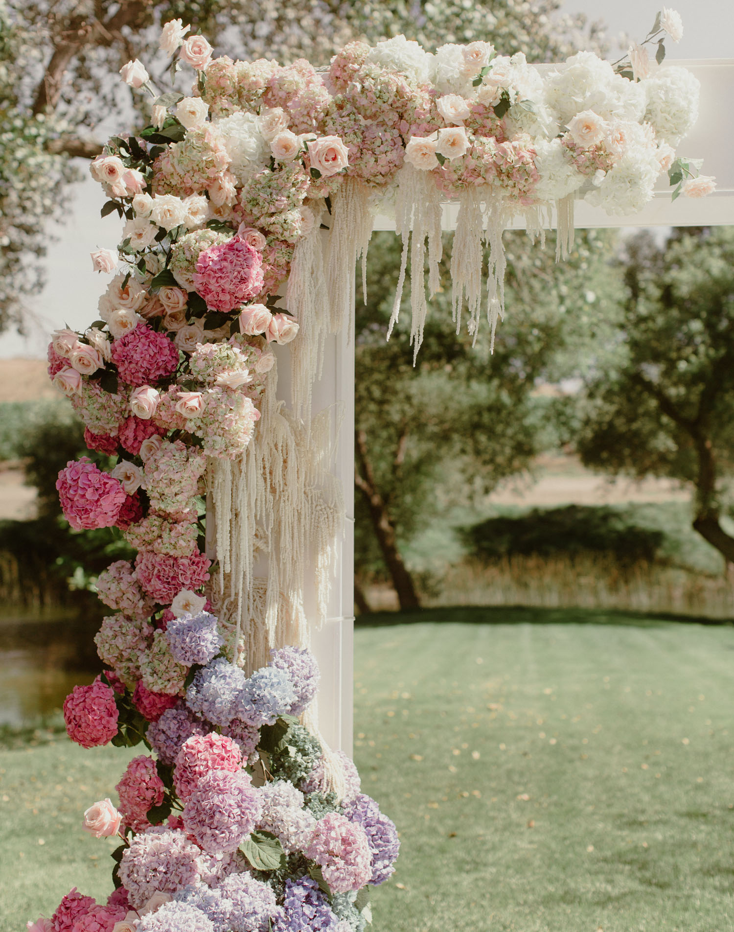 pink and purple floral arch