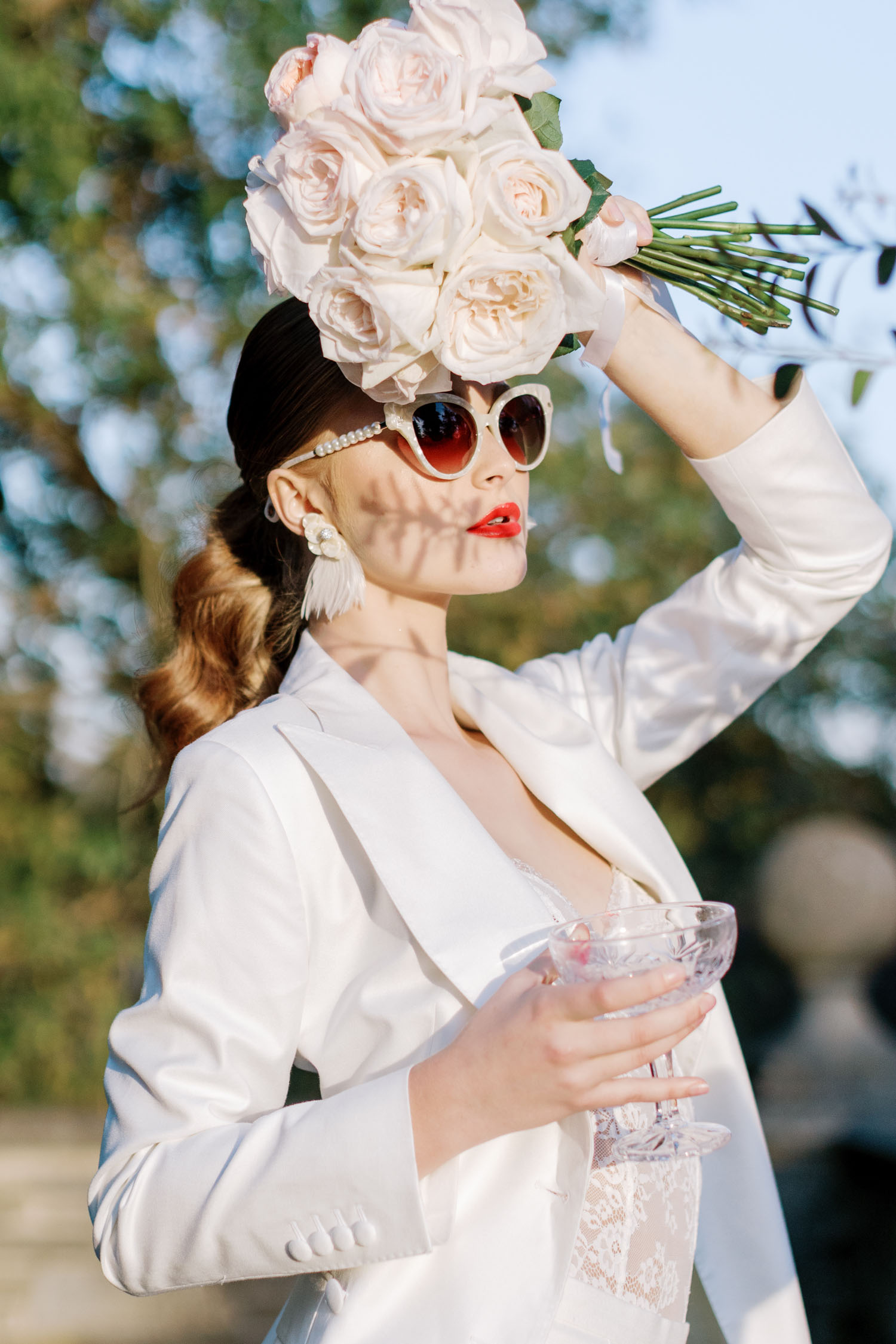 chic bridal suit and sunglasses