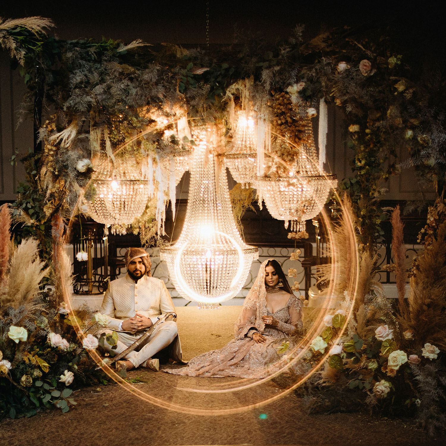 luxe South Asian wedding with chandelier decor