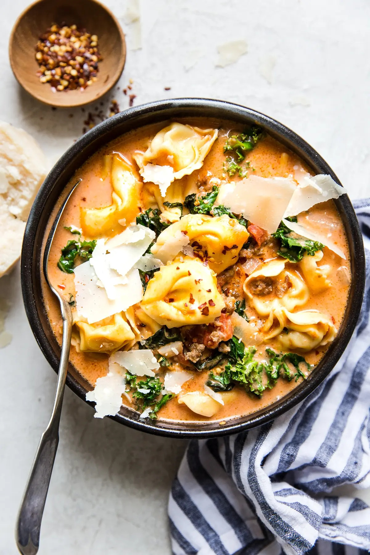 Creamy Tomato Tortellini Soup with Sausage and Kale by The Modern Proper