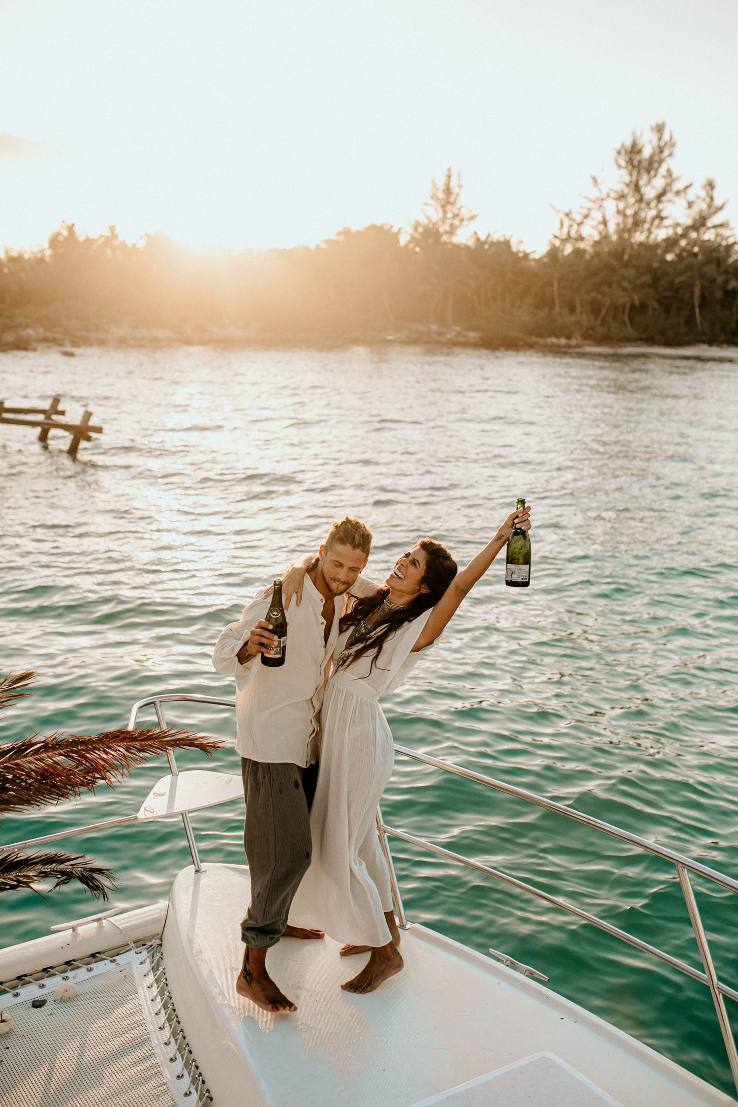 couple celebrating their destination wedding on a yacht