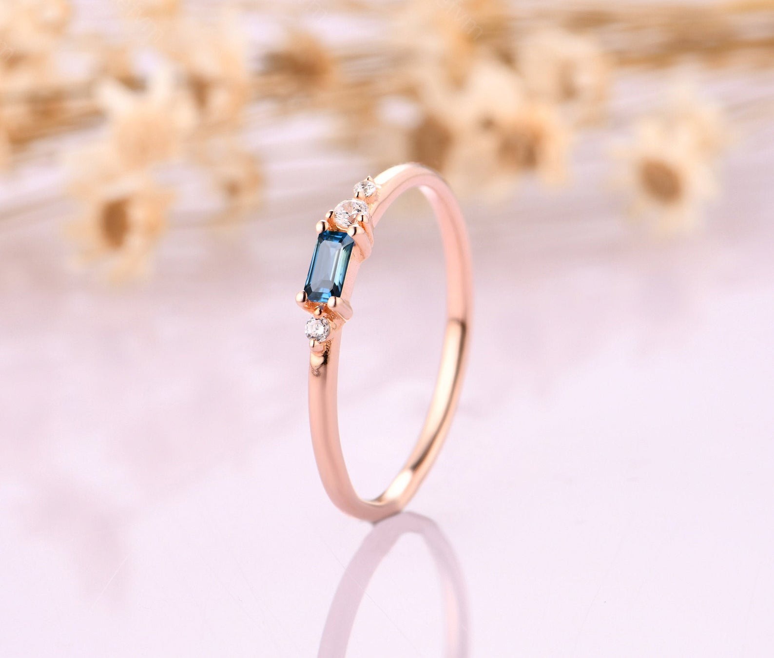 minimalist blue topaz gemstone engagement ring