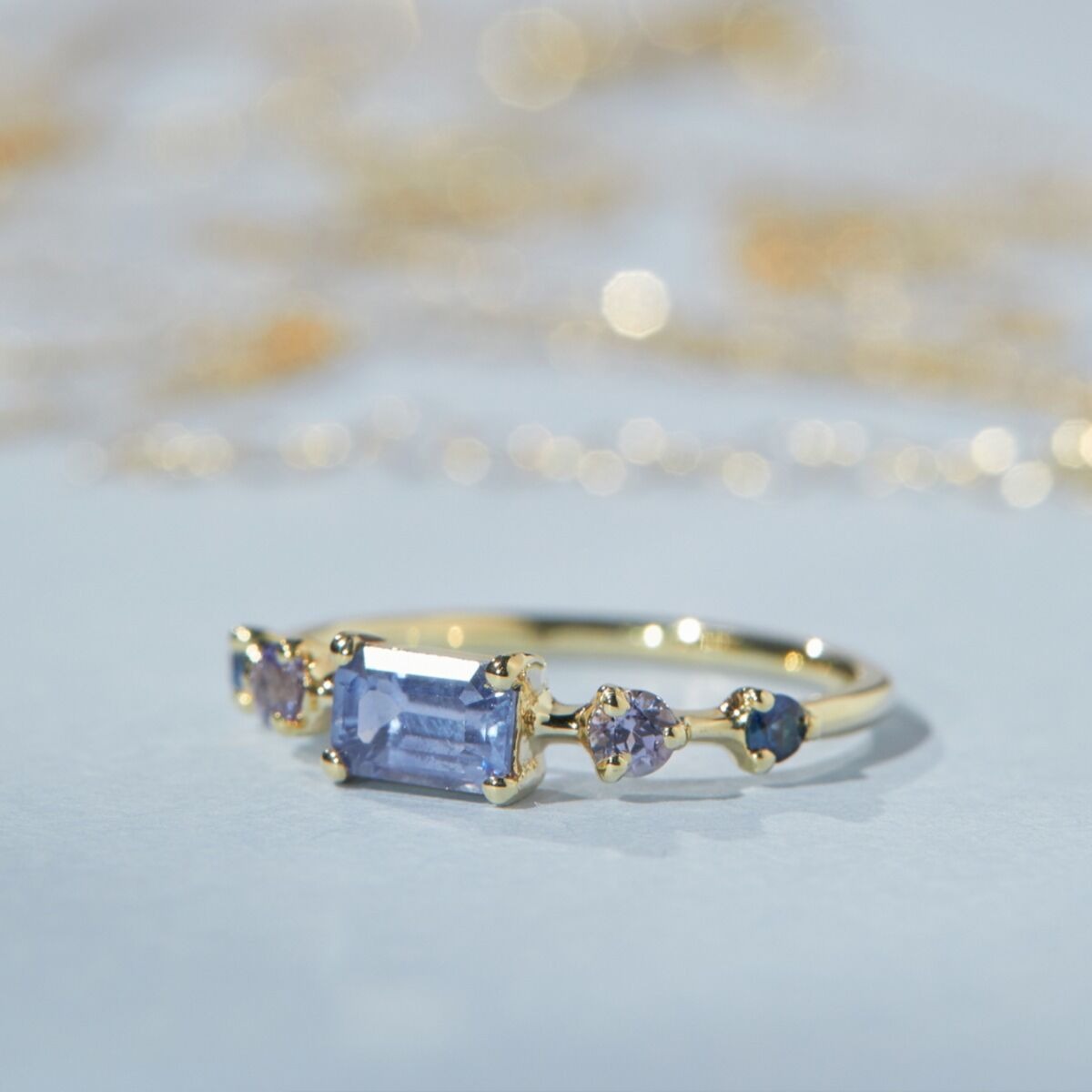 non traditional emerald cut sapphire gemstone engagement ring