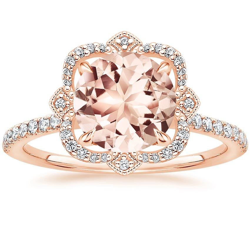 morganite gemstone engagement ring with intricate decorative halo