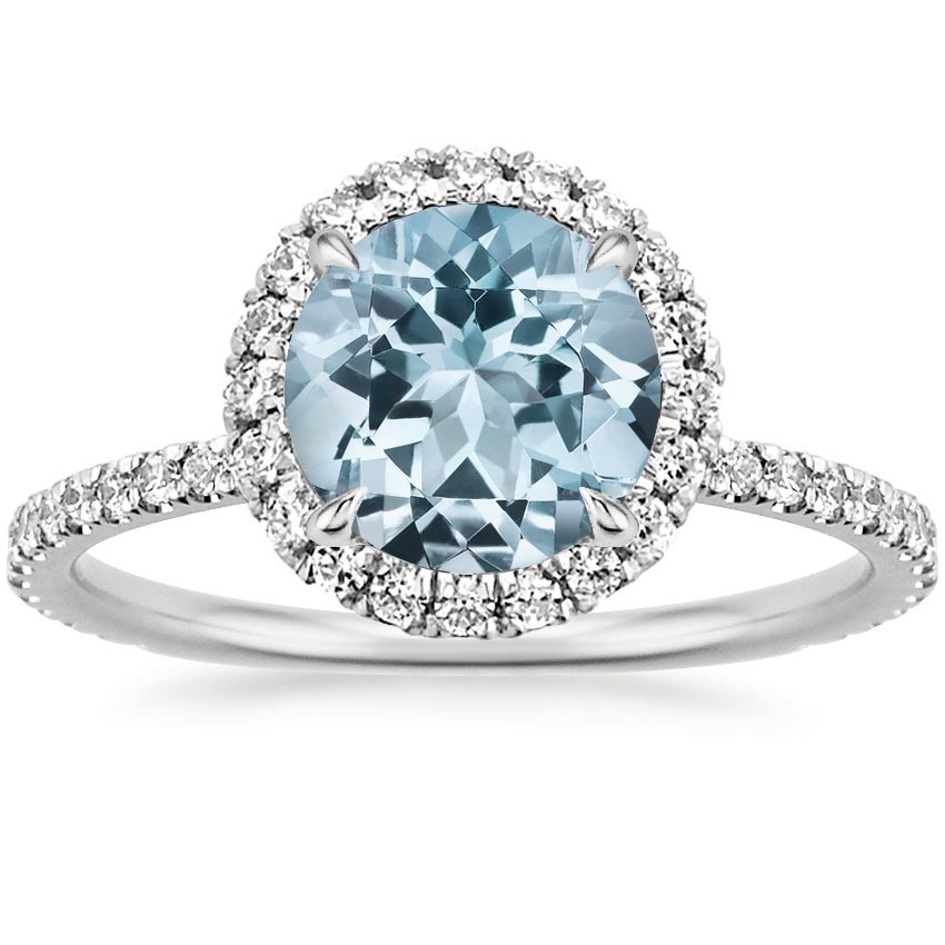sky blue aquamarine gemstone engagement ring with halo and studded silver band