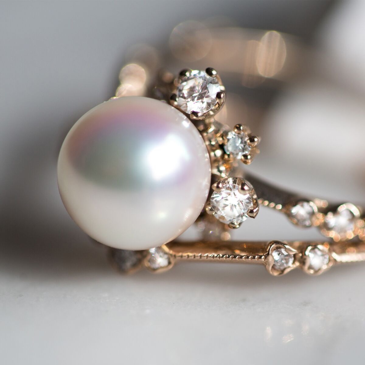 nature inspired winter pearl non diamond engagement ring with gold band