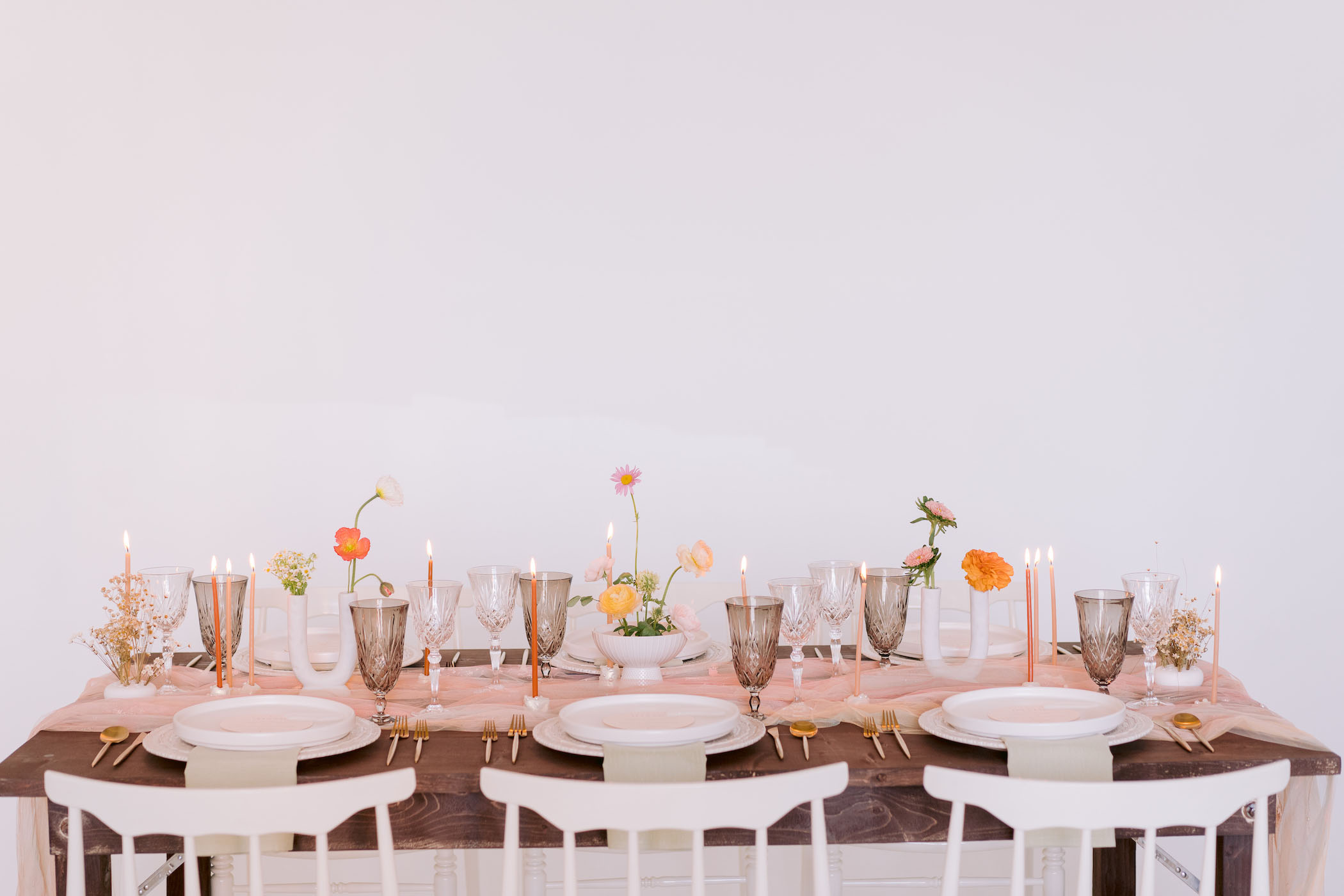 Blush toned wedding reception table decor