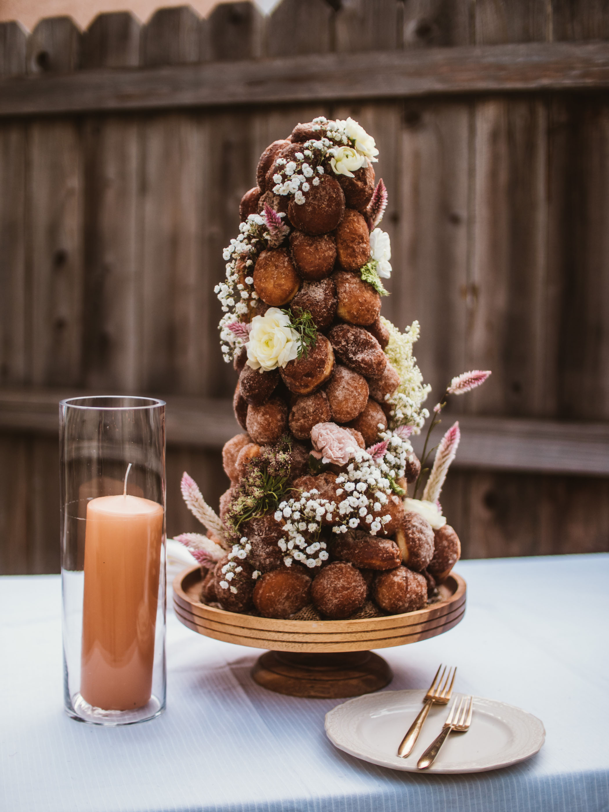 Donut hole wedding cake decorated with baby's breath