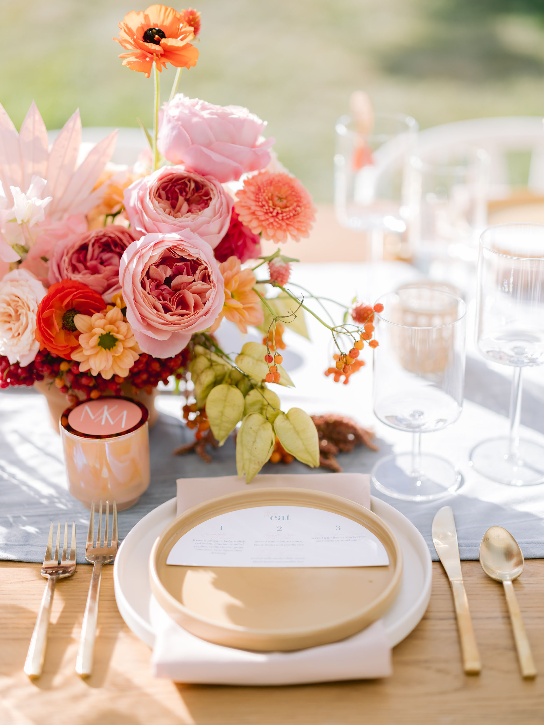 Pink floral centerpiece display for housewarming party table