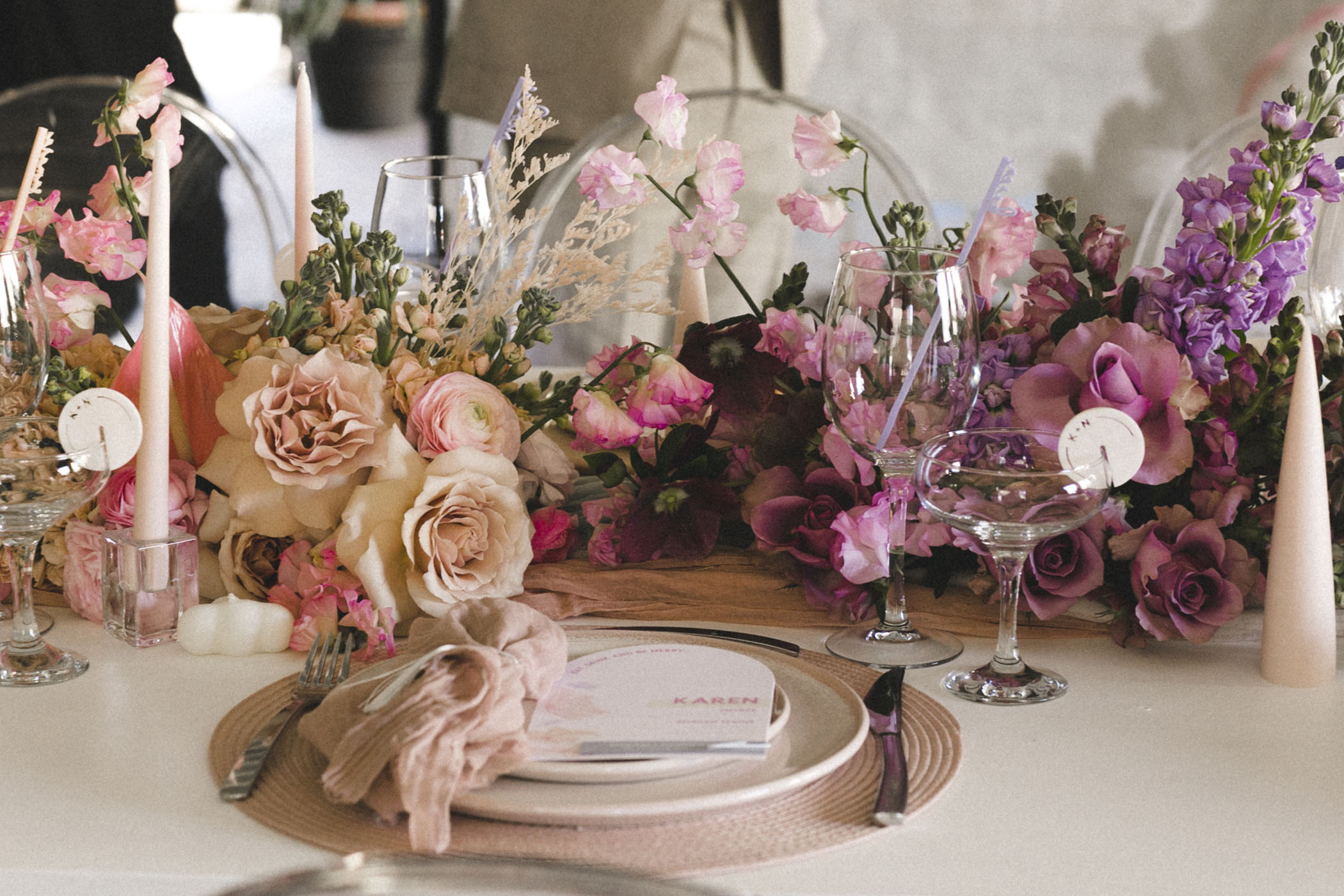 pink and purple wedding table florals