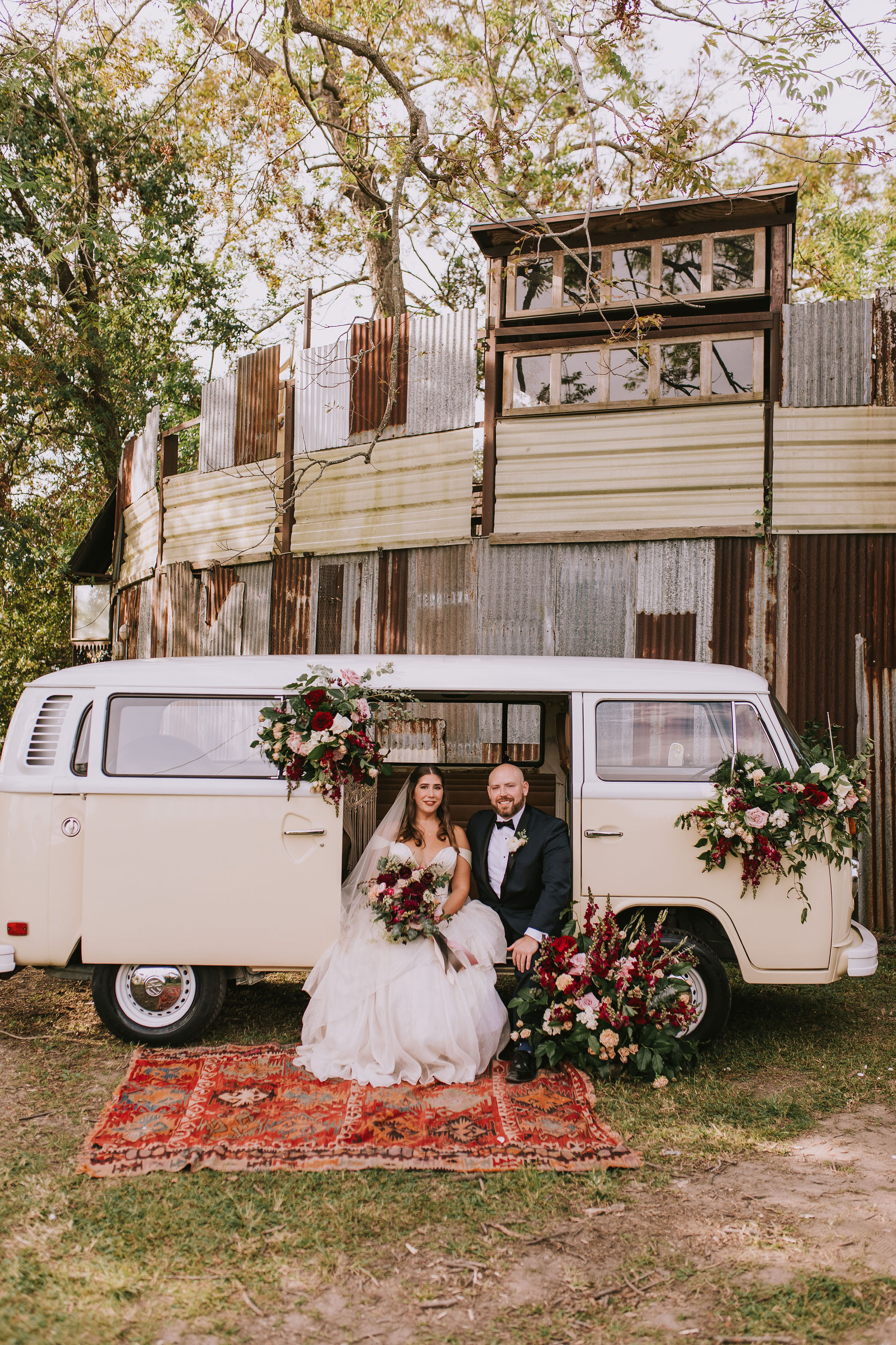 Bride and groom in vintage van