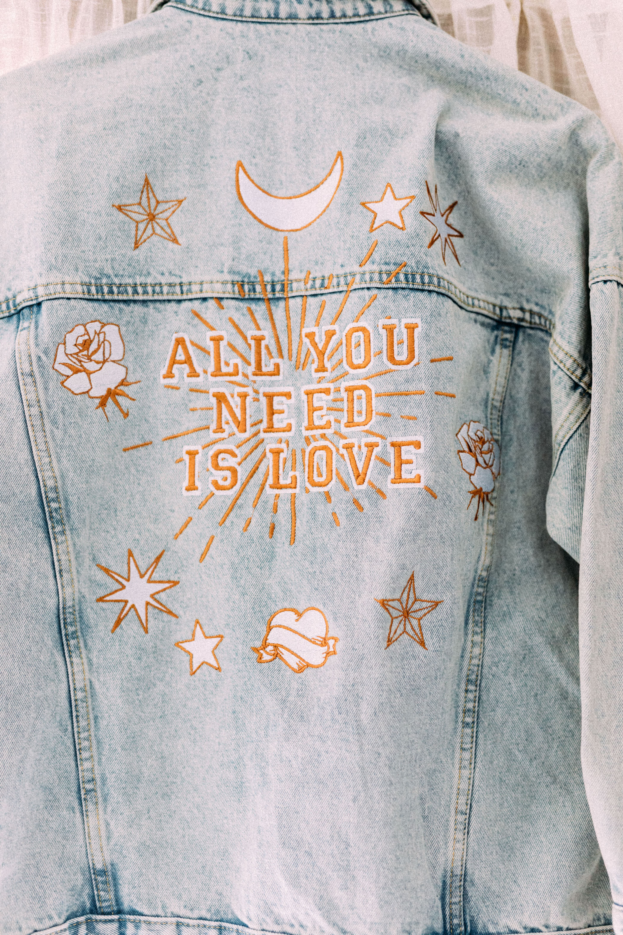 all you need is love denim jacket