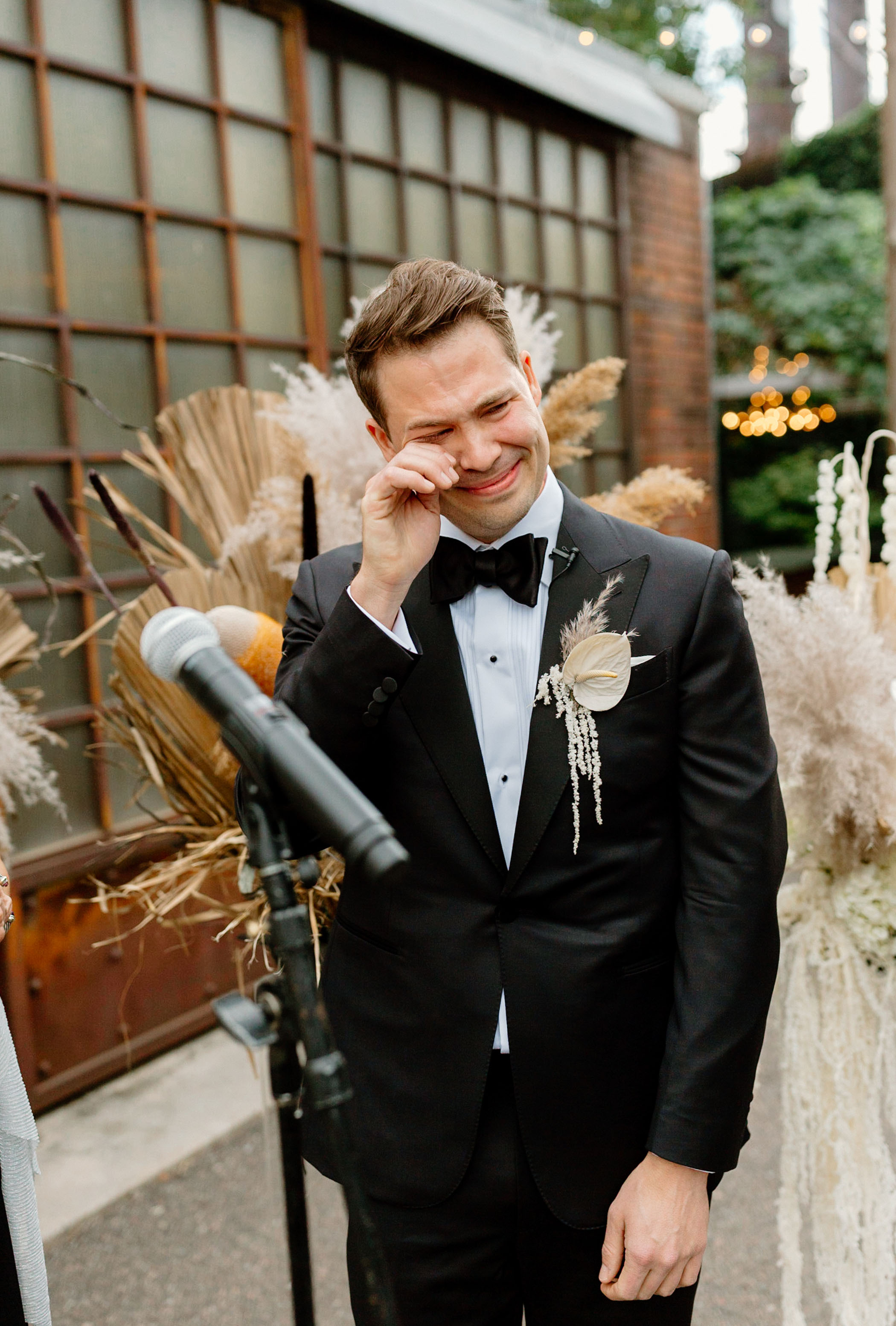 Groom crying seeing his bride for the first time